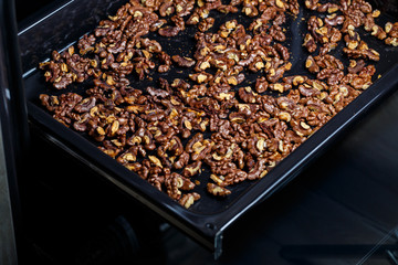  Roasted walnuts. Nuts help the brain work. Fatigue Food, Healthy Nuts. Superfood, vegan, vegetarian food concept. Macro of walnut texture, selective focus. Healthy snack.
