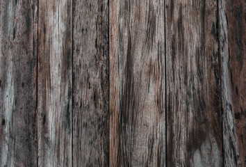 Top view of black and brown wooden texture background. Background with horizontal patterns of planks.