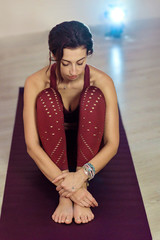 athletic woman practicing yoga at home, freedom concept. Calmness and relaxation, practice at home, self-isolation