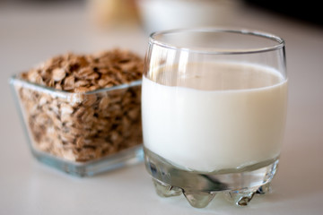 oatmeal and milk in glass container