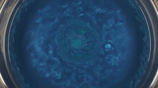 Rheoscopic fluid. Beautiful movement of particles in a liquid. Fantastic patterns and shapes. 50 fps