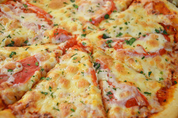 Pizza Margherita in the box, top view. Pizza Margarita with Tomatoes, Basil and Mozzarella Cheese close up. texture