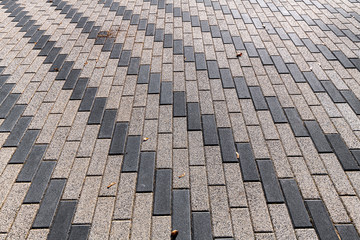 The Background from a gray sidewalk paving slabs