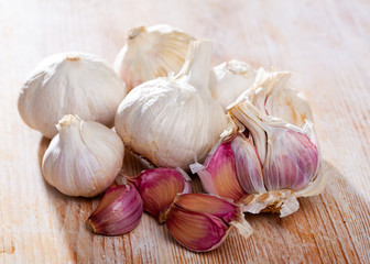 Garlic on wooden table closeup