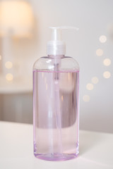 disinfectant and cleanser in a jar with dispenser.