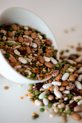 mixed legumes in bowl spilling out