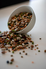 mixed legumes in bowl spilling out