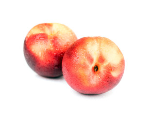 Fresh raw nectarine isolated on white