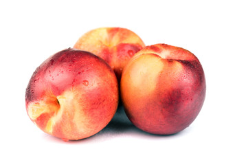 Fresh raw nectarine isolated on white