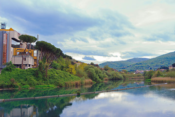 Fototapeta na wymiar Landscape across the river in Tivoli overlooking the river Anio