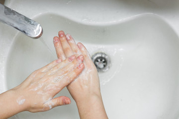 Hand washing under water with soap, disease prevention