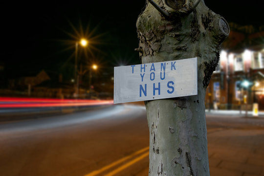 Thank You NHS Sign During Coronavirus Pandemic In The UK City Of London At Night