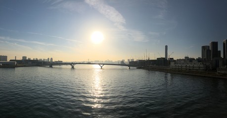 Naklejka premium sunset over the river