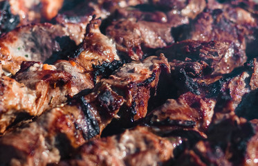 Barbecue. Meat. Grill. Roasting. Fire. Cooking kebab. Meat background.