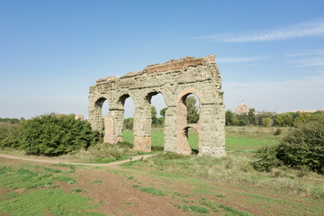 Fototapeta na wymiar ancient Roman aqueduct of the 2nd century B.C. in Rome