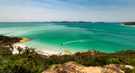 Fototapeta premium Whitehaven beach landscape with boat trail on the water. Whitsundays Islands, Queensland, Australia. 