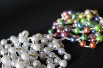 row of colorful Pearl strings abstract background