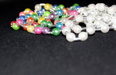 row of colorful Pearl strings abstract background
