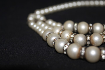 row of Pearl strings abstract background