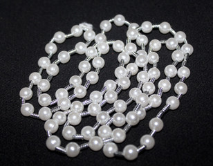 row of Pearl strings abstract background