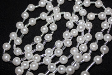 row of Pearl strings abstract background