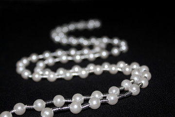 row of Pearl strings abstract background
