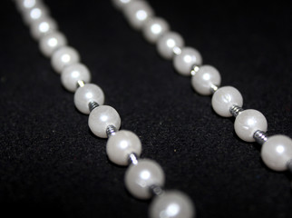 row of Pearl strings abstract background