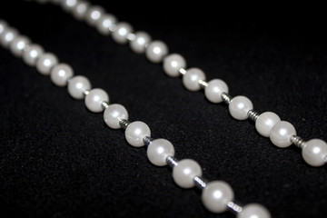 row of Pearl strings abstract background