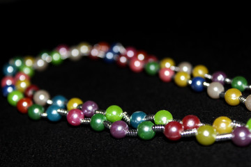 row of colorful Pearl strings abstract background
