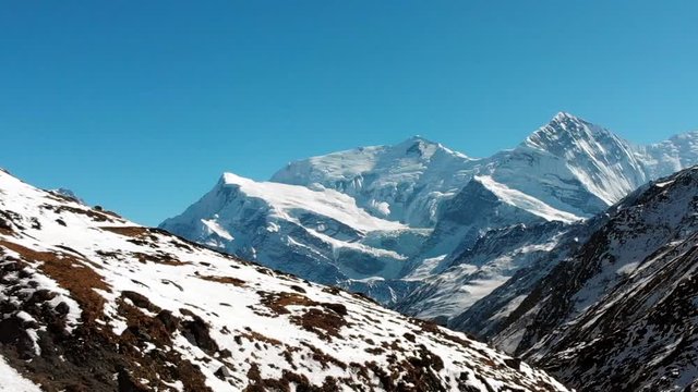 Aerial slider shot of Mount Annapurna three and Ganapurna Himalayas Mountain from Manang Valley, Nepal.