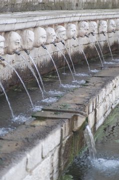 Fountain of the 99 Spouts, Historic fountain with 99 jets distribuited along three walls, L Aquila, Italy