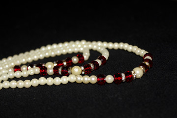 Pearl strings abstract necklace background