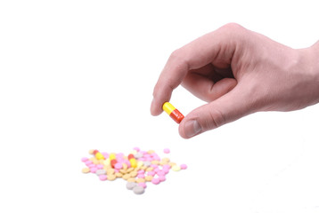 medicines, protective mask, thermometer, hand isolated on white background