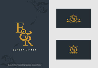Obraz na płótnie Canvas ER logo initial vector mark. Gold color elegant classical symmetric curves decor.