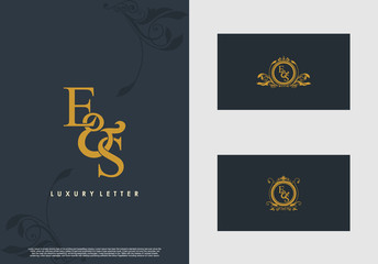 Obraz na płótnie Canvas ES logo initial vector mark. Gold color elegant classical symmetric curves decor.