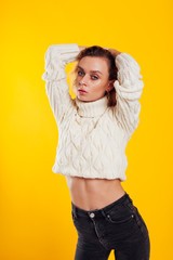 Beautiful fashionable blonde woman in white sweater © dmitriisimakov