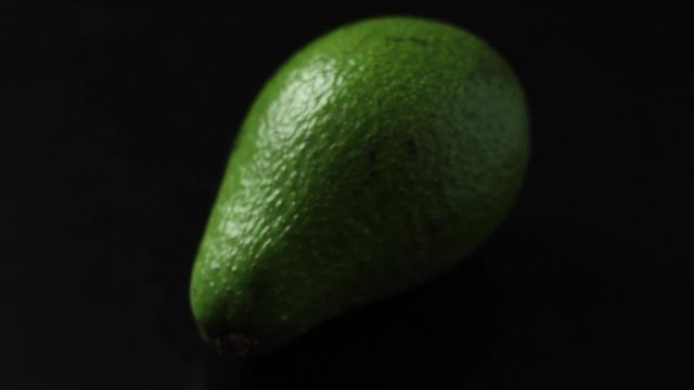 Nutritious avocado in a dark light setup rack focus shot 