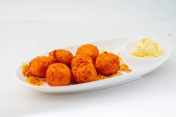 cheese balls with sauce