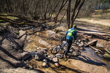 Moving by bike  across the creek