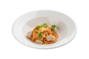 Chicken meatballs with pasta and tomato sauce on white plate isolated on white background