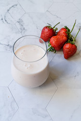 Kefir. Healthy Organic Drinkable Yogurt with Strawberries Fruit in Glass / Buttermilk Ayran.