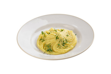 Mashed potato with dill on white plate isolated on white background