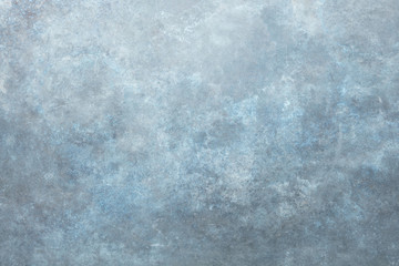 Rust and oxidized metal background. Old metal iron panel. Vintage abstract background with dim gray and blue, colors and space for text or image. Old distressed blue grungy wall background