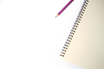Notebook and simple pencils on a white background