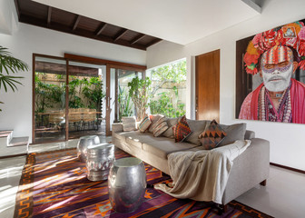 Cozy house with ethnic decor and stylish interior at lounge room
