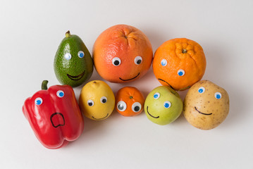 Vegetables and fruits characters with Googly eyes and funny faces. Proper nutrition concept