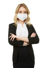 Blond businesswoman in a mask. Protection is important.