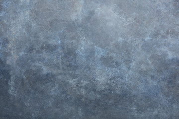 Rust and oxidized metal background. Old metal iron panel. Vintage abstract background with dim gray, dark gray, brown colors and space for text or image. Old distressed blue grungy wall background