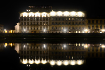 Naklejka premium Night view reflection old hotel Florence, Italy