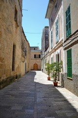 Alcudia, Mallorca, Spain. Alcudia Old Town medieval street and buildings